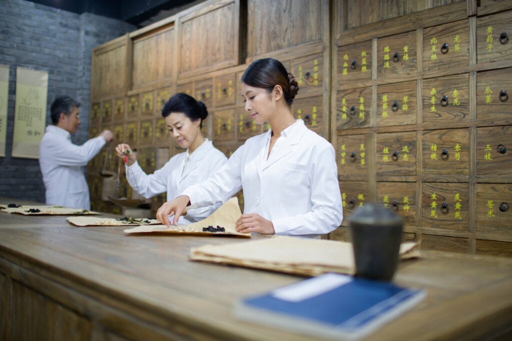 Chinese doctors in traditional Chinese medicine pharmacy